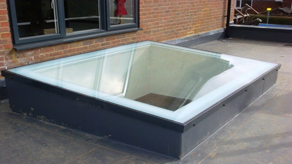 Signature flat glass rooflight installed on external kerb
